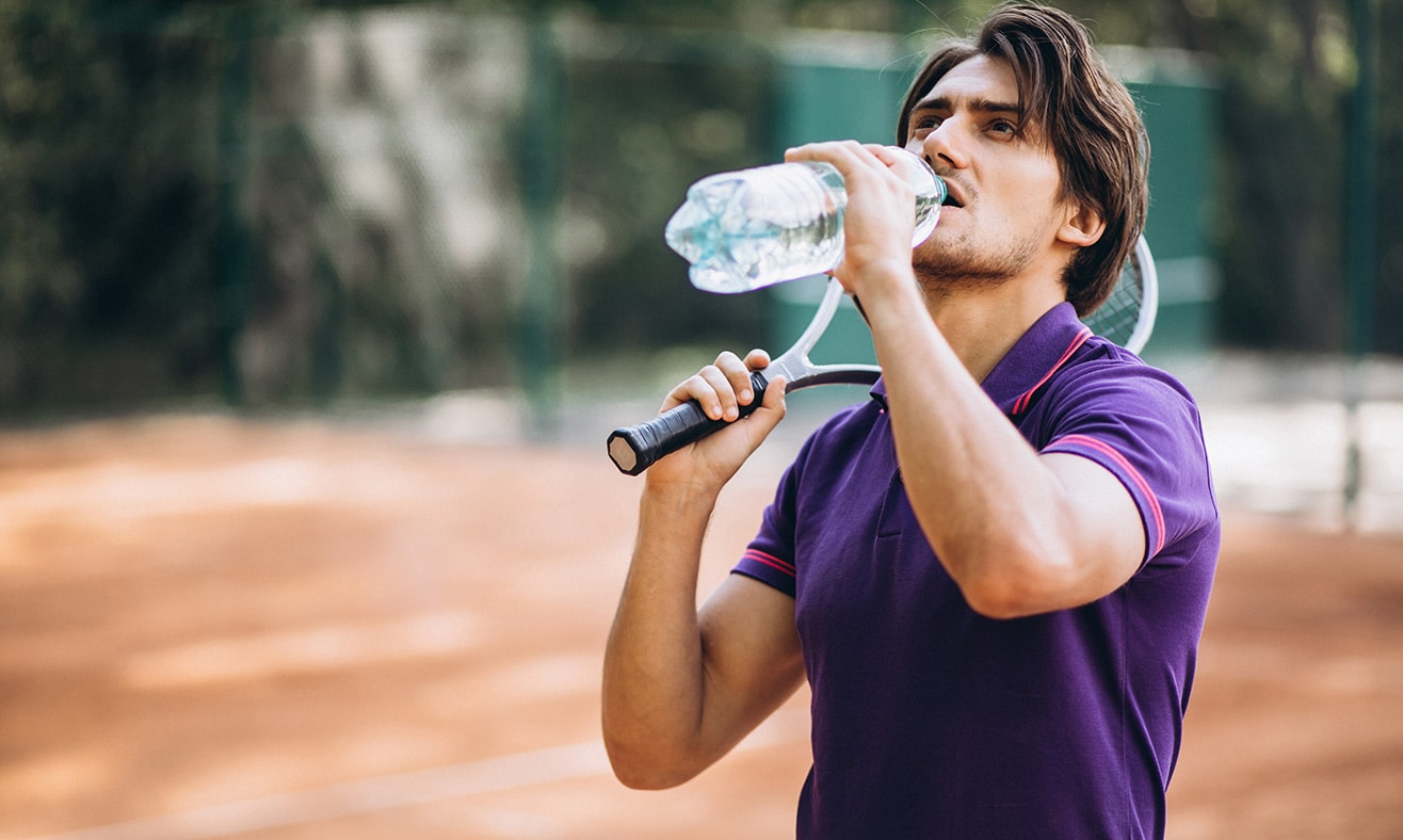 Athletes running and staying hydrated with alkaline water